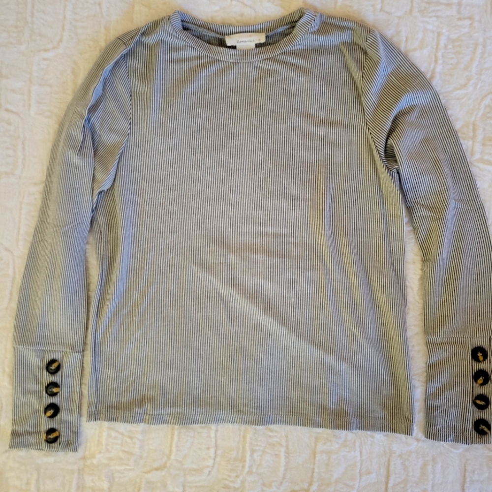 Urban romantics, adorable black and white stripe with buttons on sleeves.